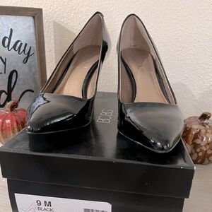 Size 9M BCBG Paris Gaminkha black Patent Pumps